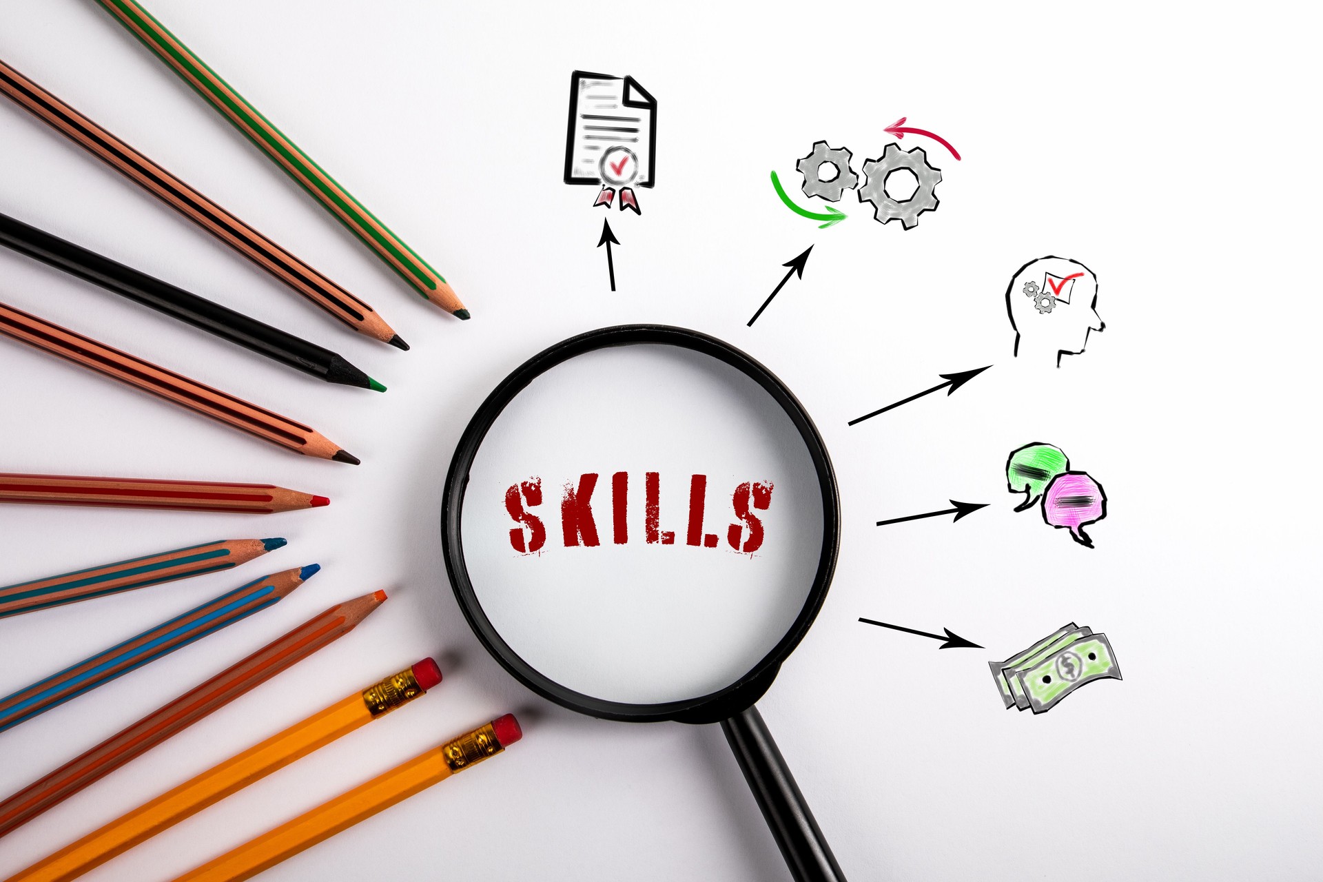 SKILLS. Black magnifying glass on a white background